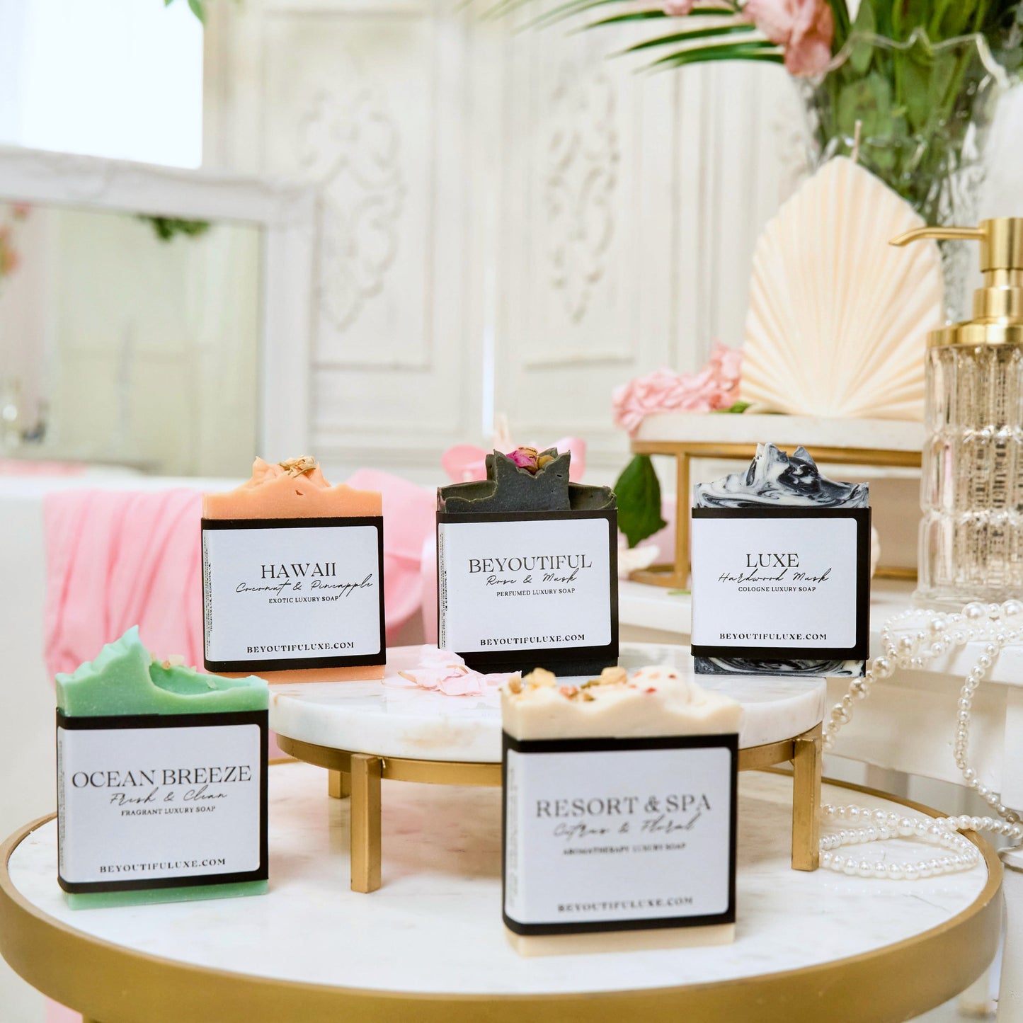 Handcrafted Beyoutiful black charcoal soap bar with a wave pattern and small red rose on top, infused with rose and musk fragrance, 3x4 inches.
A luxurious blend of soft florals and warm musk brings balance and sophistication to your routine. Infused with detoxifying activated charcoal, this bar draws out impurities and gently refines your skin’s surface, revealing a smoother, brighter complexion. Let BEYOUTIFUL replenish your glow, awaken your senses, and leave you feeling effortlessly beautiful within yo